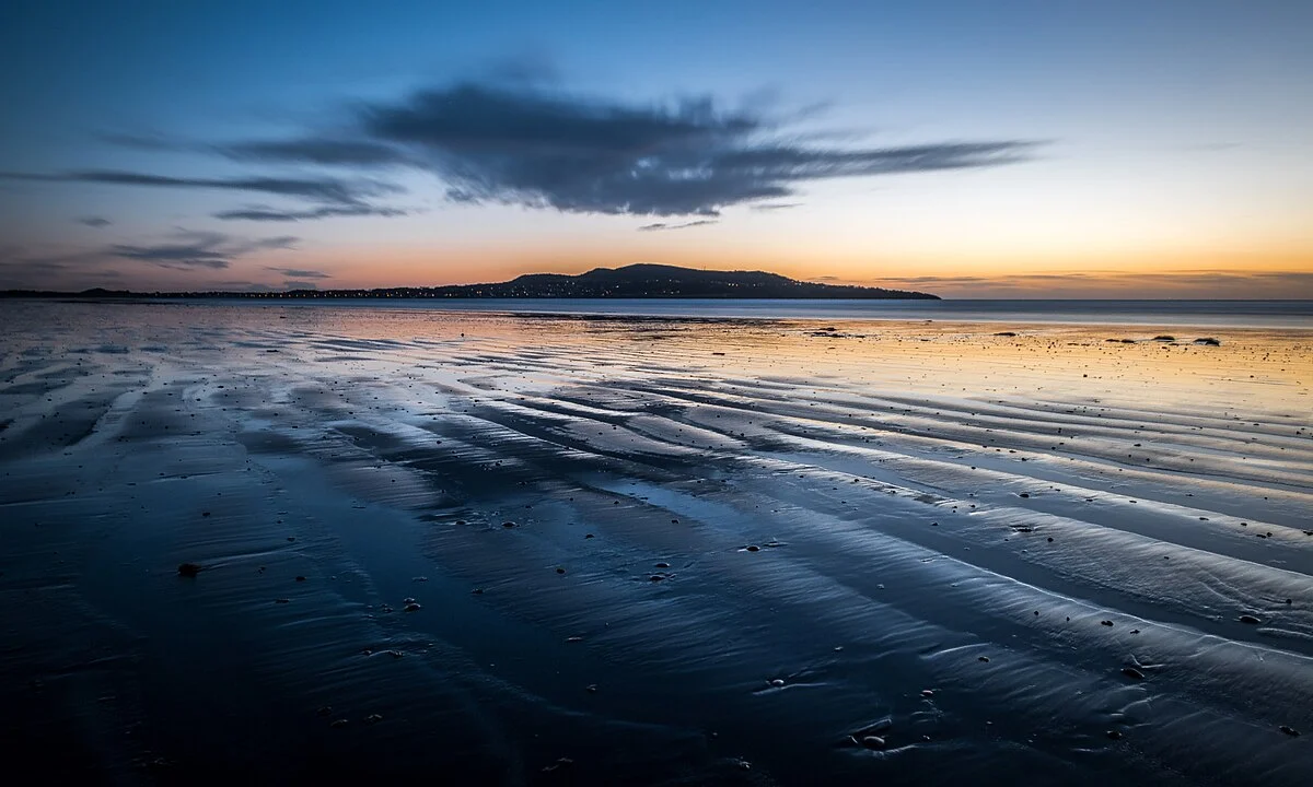 Sunrise over the tidal flats of Bull Island, Dublin Bay